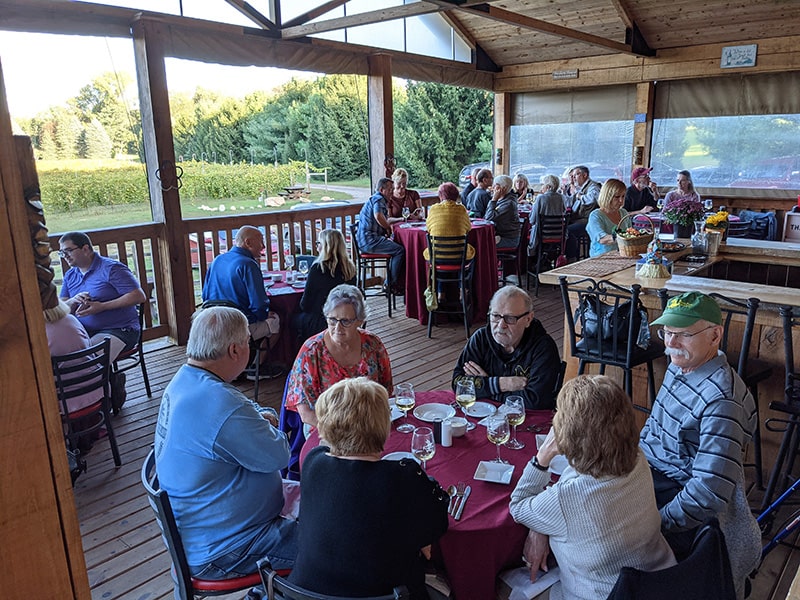 Image of Otter members enjoying a special event at Flying Otter Winery.