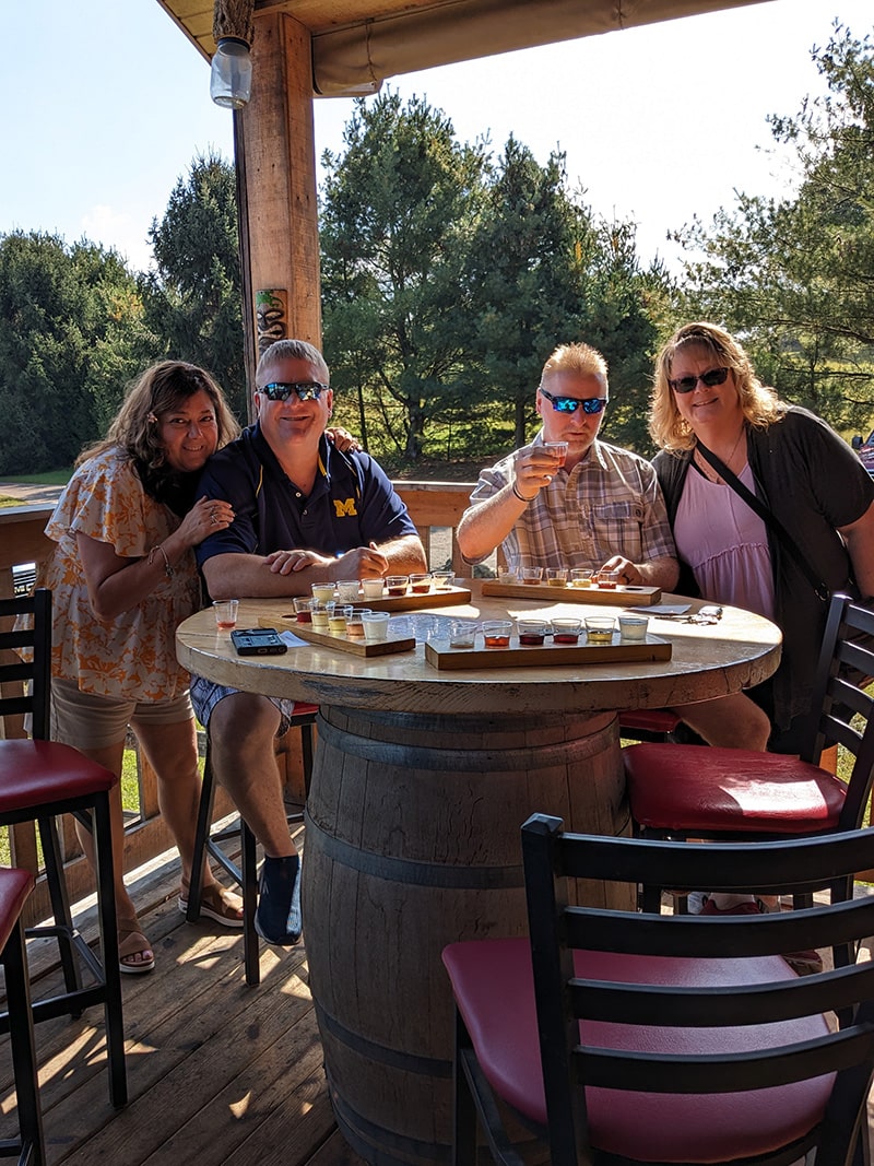 Image of Otter Club members enjoying wine at Flying Otter Tasting Room